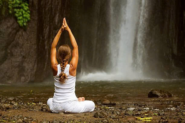 Yoga near Waterfall